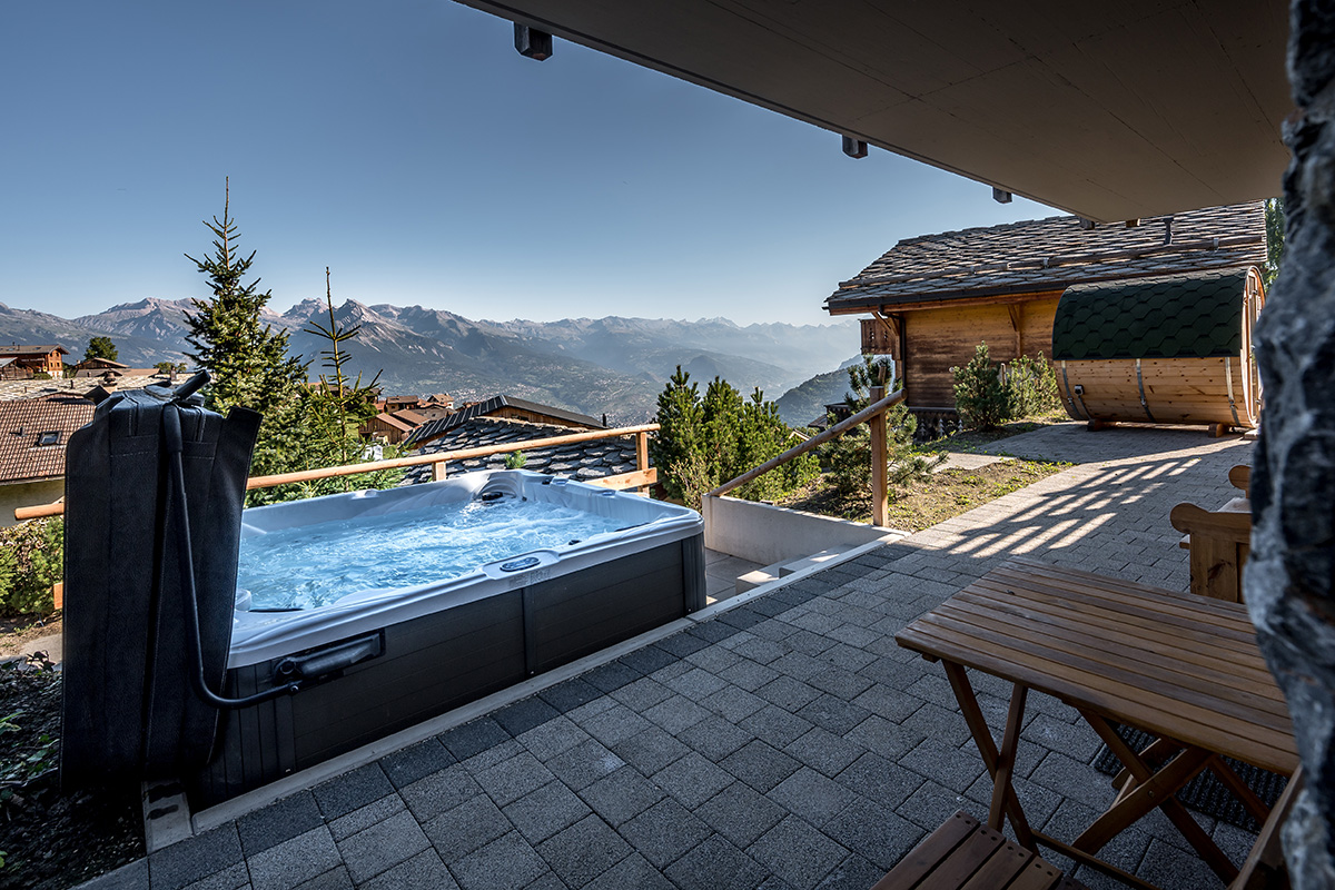 view from a jacuzzi in Nendaz Valais with mountain views